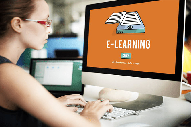 A girl participating in e-learning on a computer