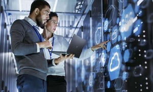 Onsite IT support team working in cloud server room