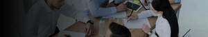 A group of employees sitting at a table